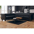 Sofa aus Kunstleder mit Knopfheftung